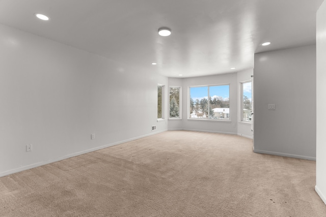 35316 Burgundy, Sterling Heights, MI 48312 - spare room featuring baseboards, light colored carpet, and recessed lighting