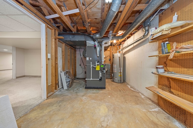 unfinished below grade area featuring water heater and heating unit