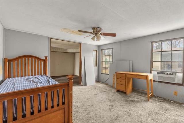 bedroom featuring a closet, multiple windows, carpet flooring, and cooling unit