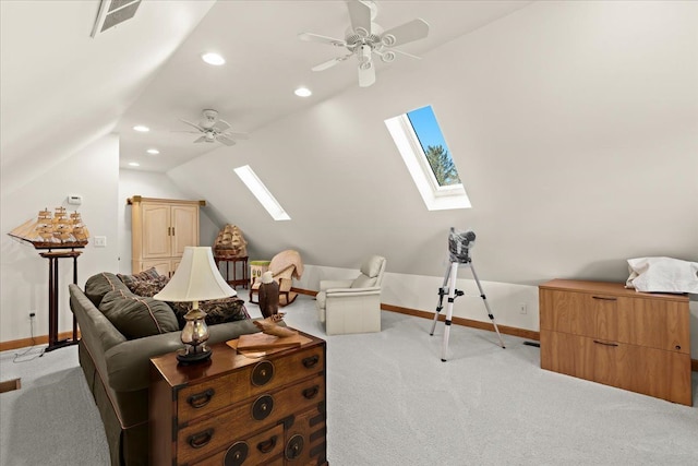 interior space with recessed lighting, baseboards, lofted ceiling with skylight, and light colored carpet