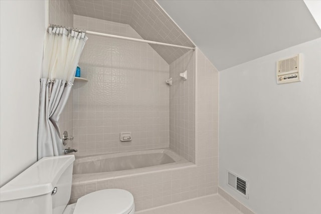full bath featuring visible vents, toilet, bathtub / shower combination, and vaulted ceiling