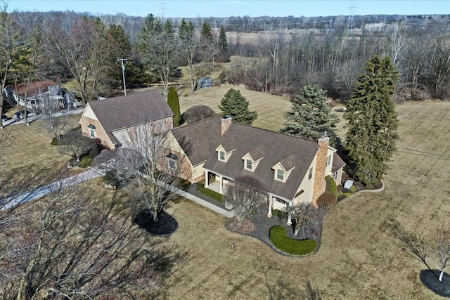 aerial view with a wooded view
