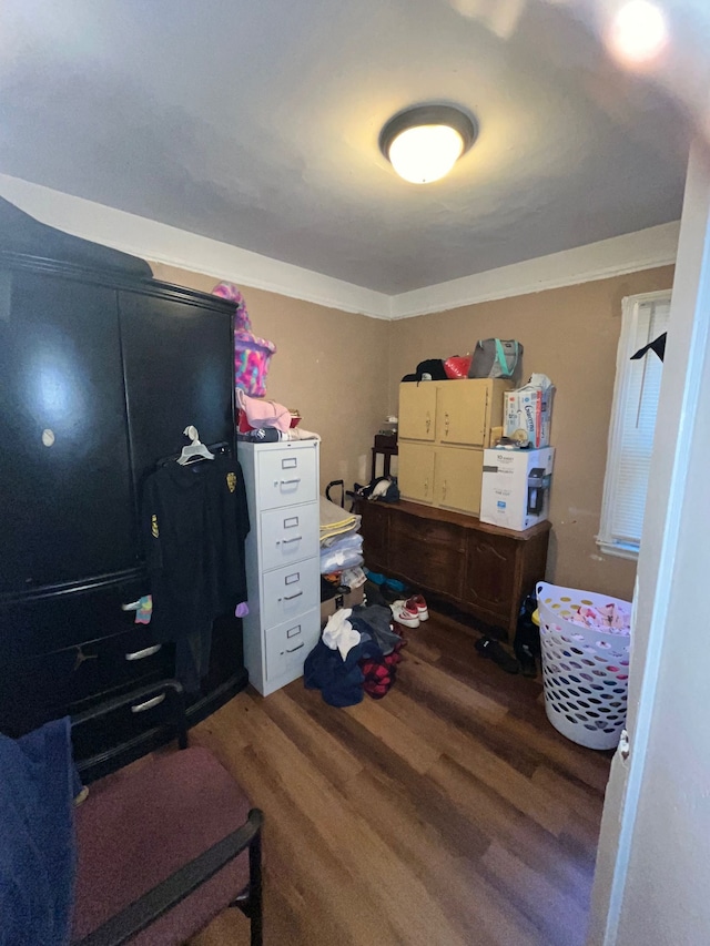 bedroom featuring wood finished floors