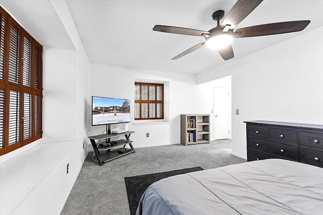 bedroom featuring carpet floors, ceiling fan, and baseboards