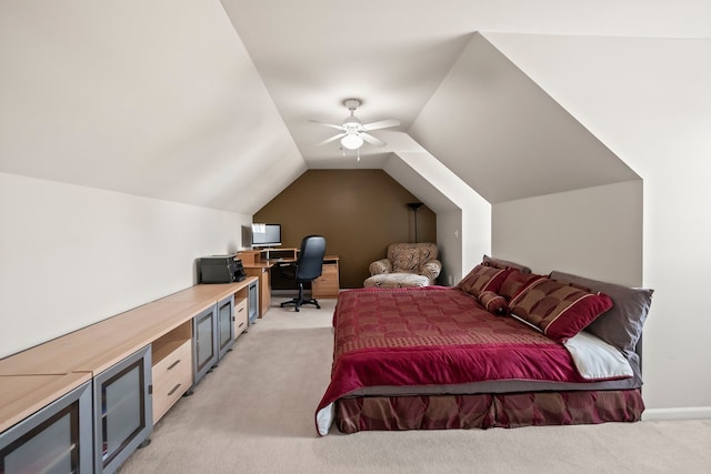 bedroom with light carpet, vaulted ceiling, and ceiling fan