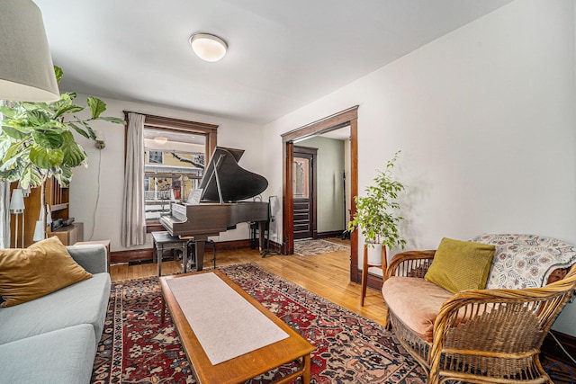 sitting room featuring wood finished floors and baseboards