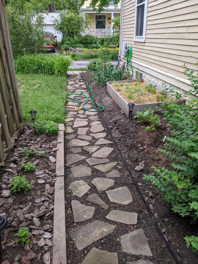 view of yard featuring a garden and fence