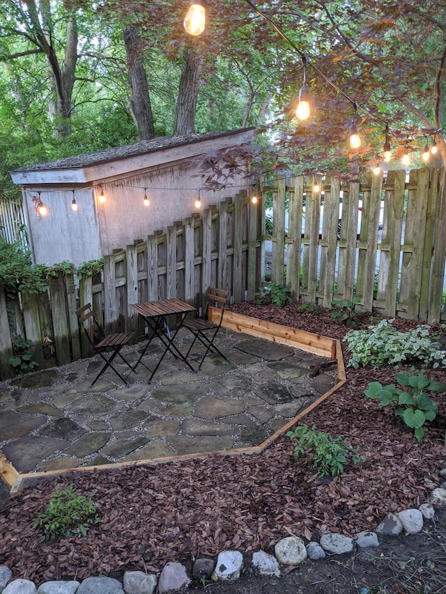 view of patio featuring fence