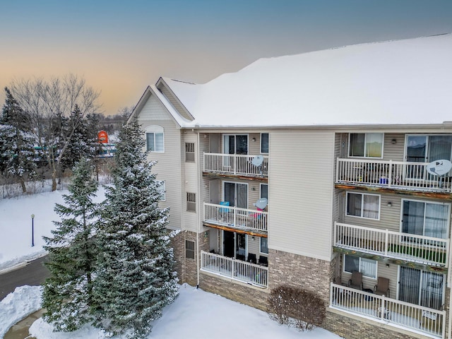 view of snow covered property