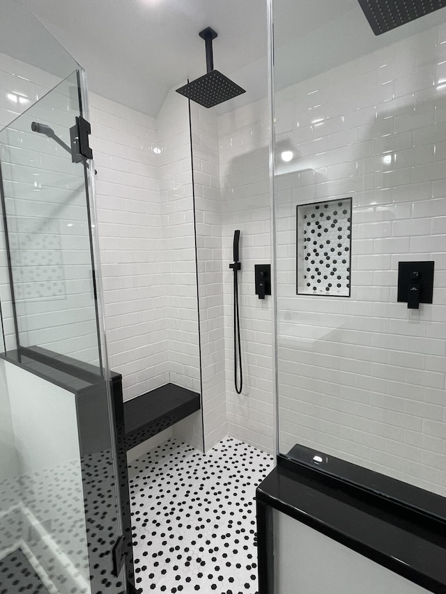 bathroom featuring a stall shower