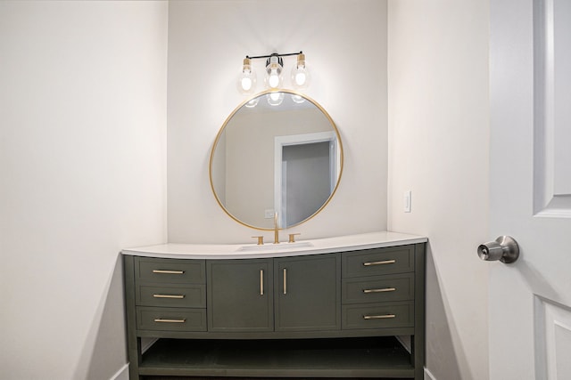 bathroom featuring baseboards and vanity