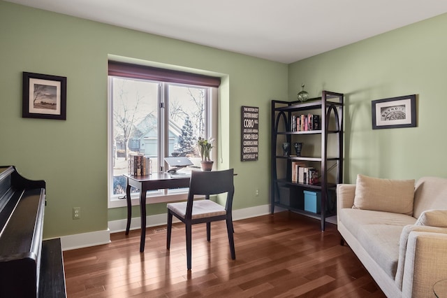 home office featuring dark wood-type flooring and baseboards