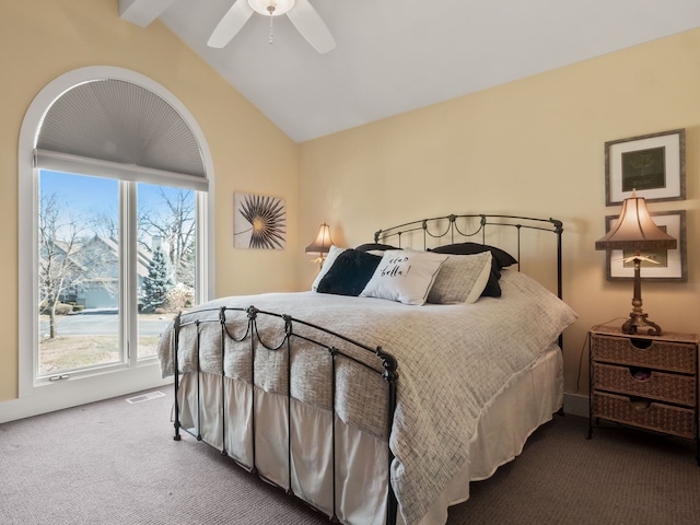 carpeted bedroom featuring visible vents, ceiling fan, and lofted ceiling