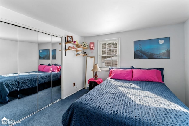 bedroom featuring a closet and dark carpet