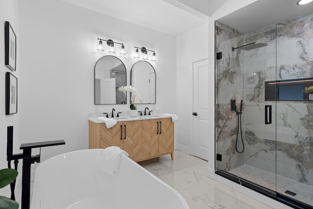 full bathroom featuring marble finish floor, double vanity, a soaking tub, and a marble finish shower