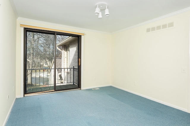empty room featuring baseboards, carpet flooring, and ornamental molding