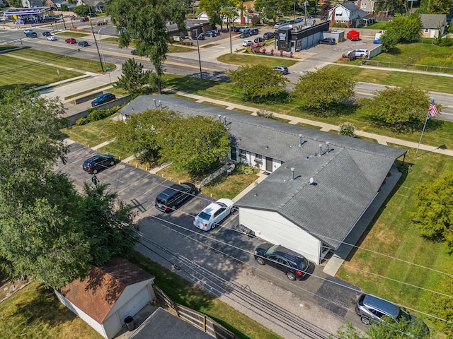 birds eye view of property with a residential view