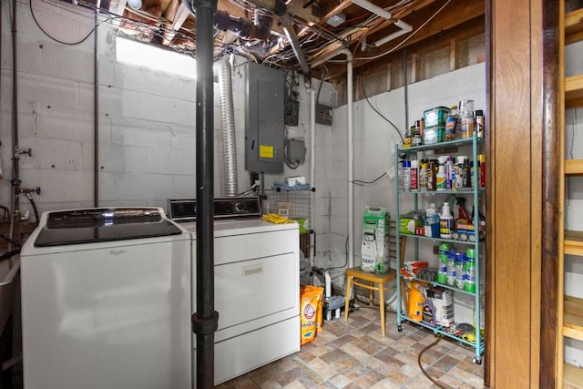 washroom featuring laundry area, independent washer and dryer, and electric panel