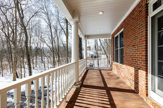 view of snow covered deck