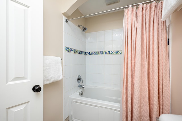 full bath featuring shower / bath combination with curtain