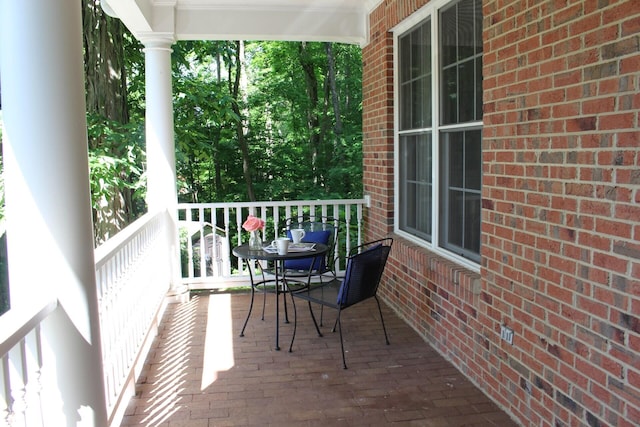 balcony featuring a porch