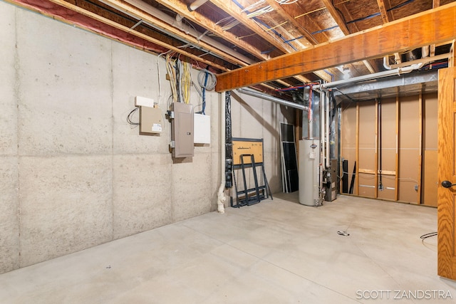 unfinished basement featuring gas water heater and electric panel