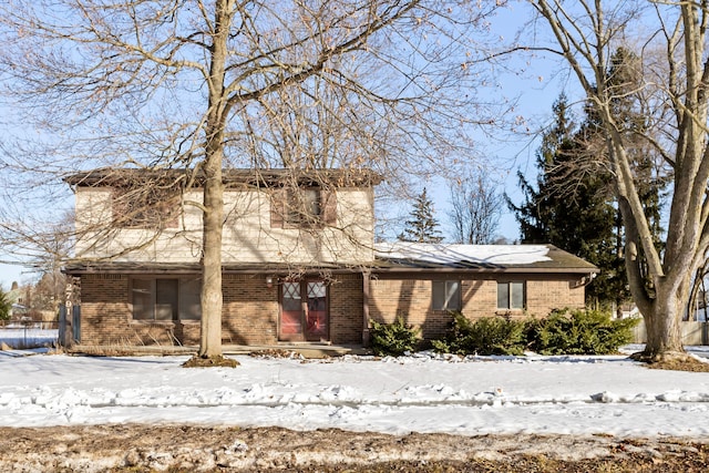 traditional home with brick siding