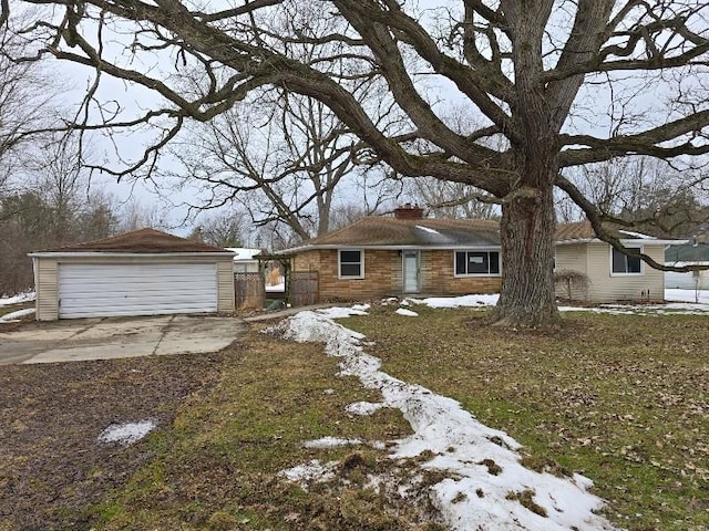 view of front of property featuring a garage and a chimney