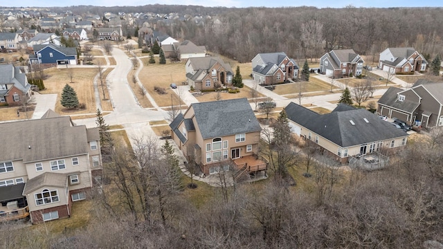 birds eye view of property with a residential view