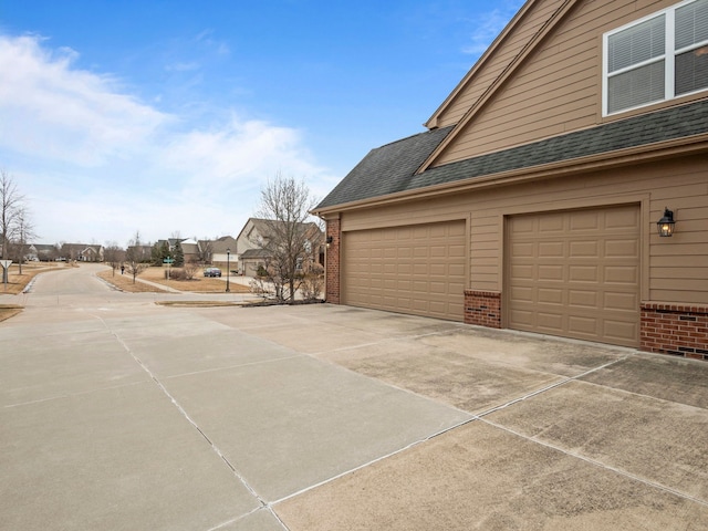 garage with driveway