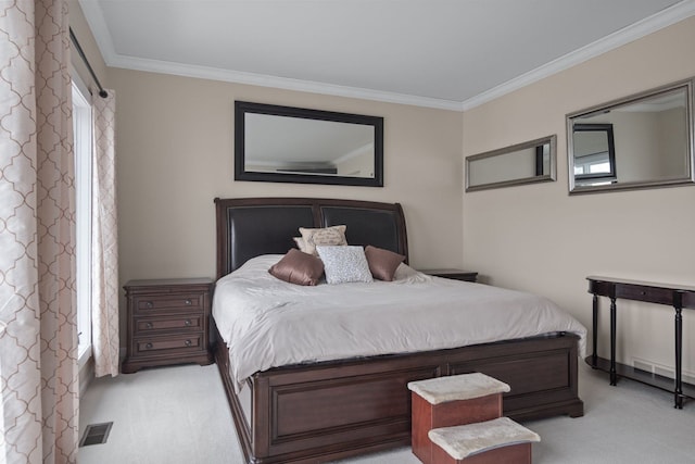 bedroom featuring visible vents, light colored carpet, and ornamental molding