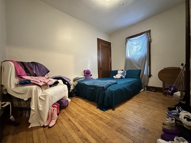 bedroom featuring hardwood / wood-style flooring