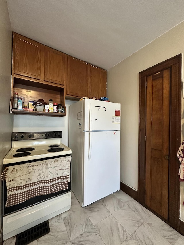 kitchen with marble finish floor, open shelves, brown cabinetry, white appliances, and baseboards