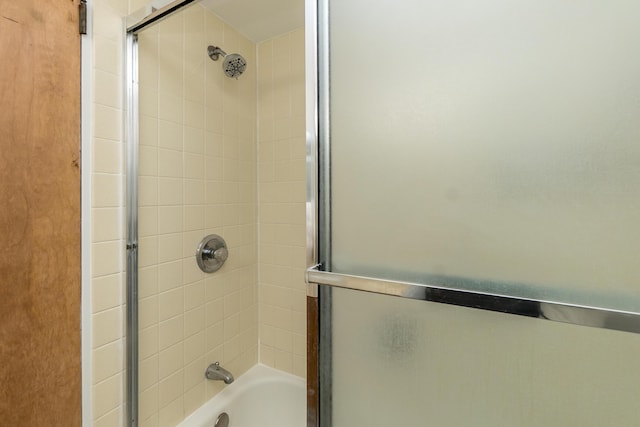 full bathroom with combined bath / shower with glass door