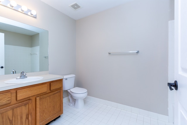 bathroom featuring visible vents, baseboards, toilet, tile patterned flooring, and vanity