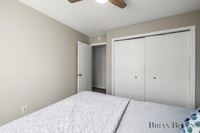 bedroom featuring a ceiling fan and a closet