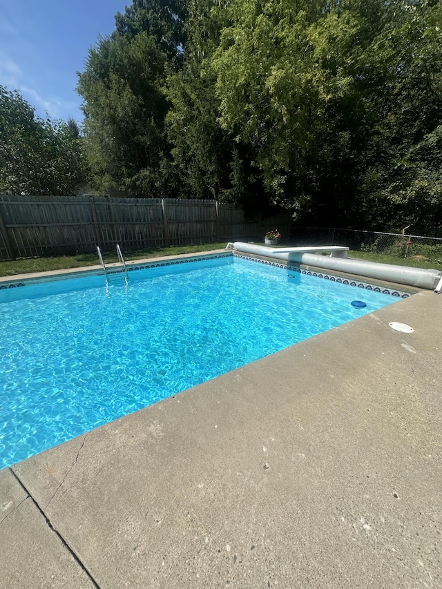 view of pool featuring a fenced backyard and a fenced in pool