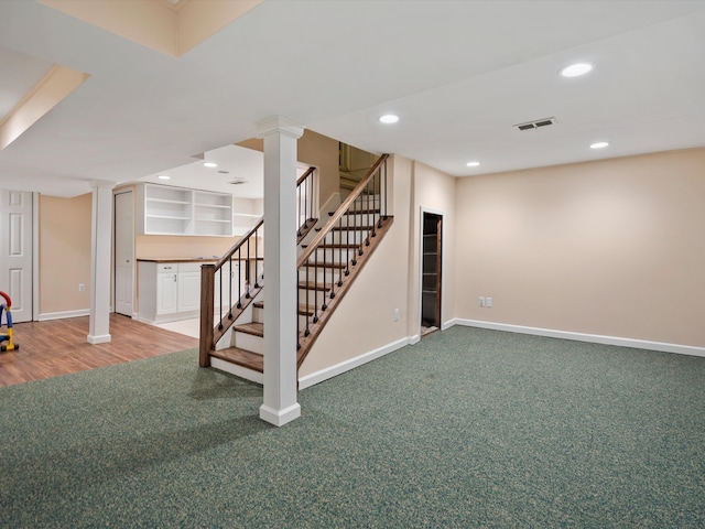 basement featuring stairs, recessed lighting, carpet, and baseboards