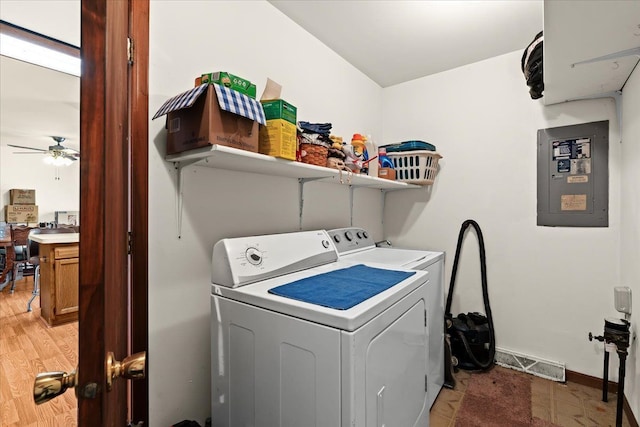 laundry area with visible vents, ceiling fan, separate washer and dryer, laundry area, and electric panel