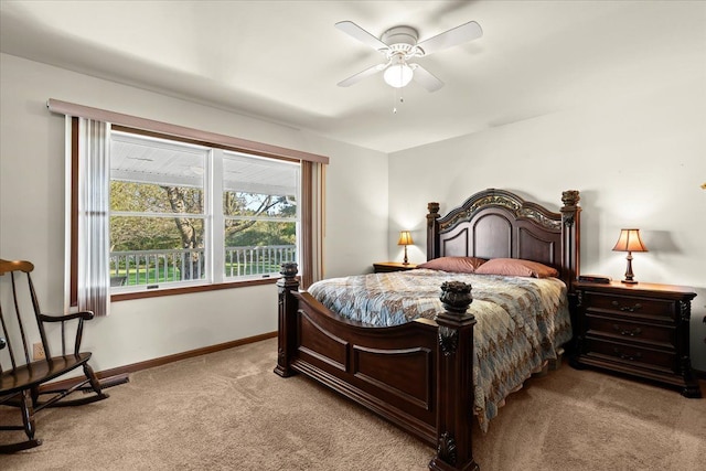 bedroom featuring light carpet, ceiling fan, and baseboards