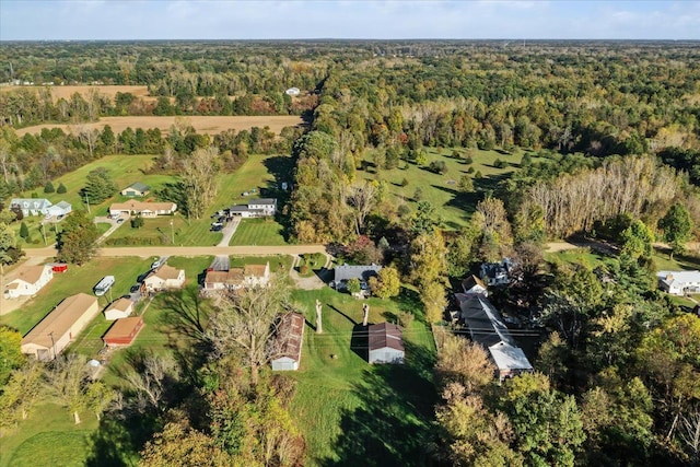 bird's eye view featuring a forest view