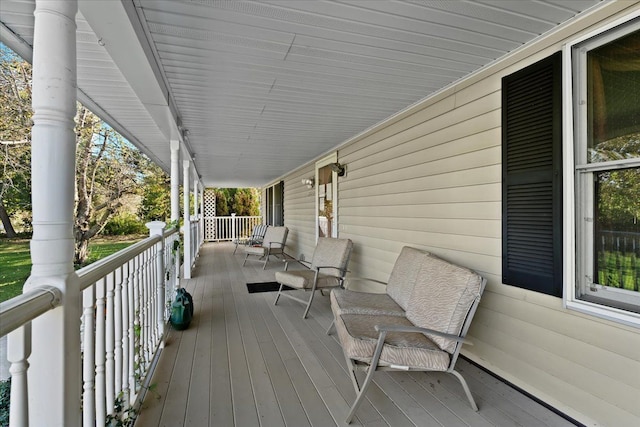 wooden deck featuring a porch