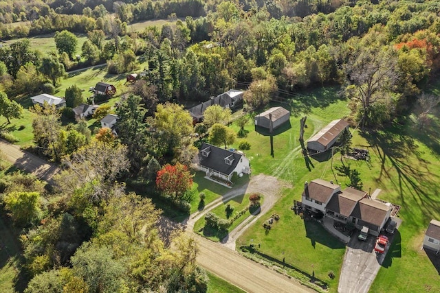 aerial view featuring a wooded view