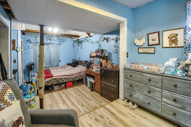 bedroom featuring wood finished floors