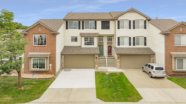 view of front of property with a garage, concrete driveway, and roof with shingles