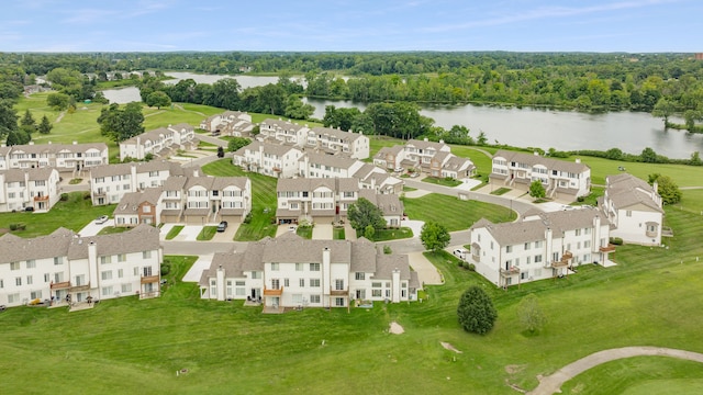 bird's eye view featuring a water view, a wooded view, and a residential view