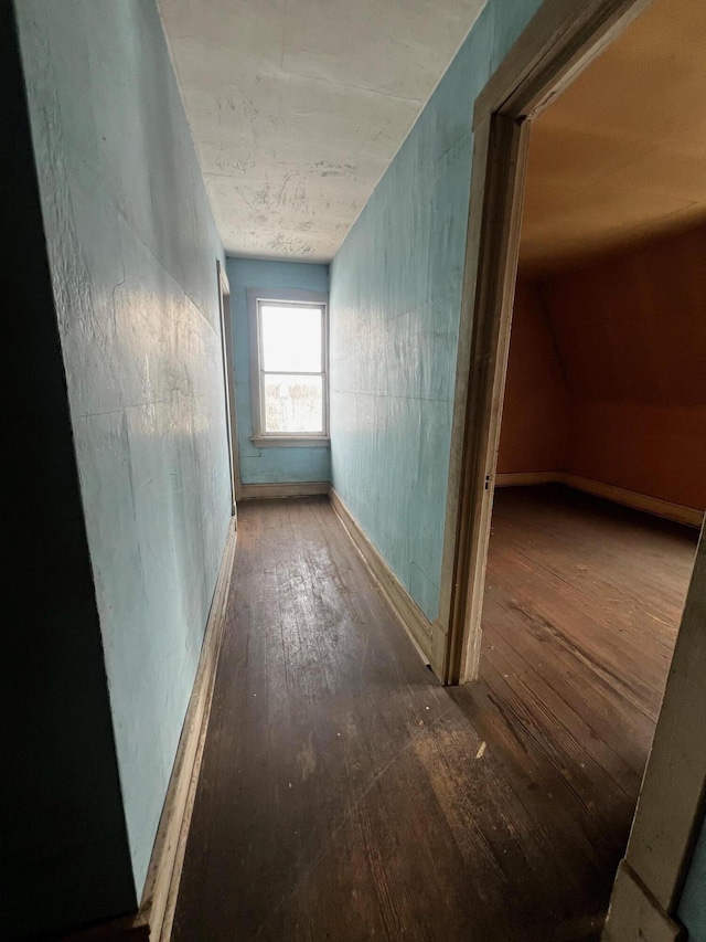 corridor featuring wood-type flooring