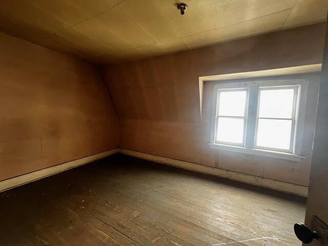 spare room with hardwood / wood-style flooring