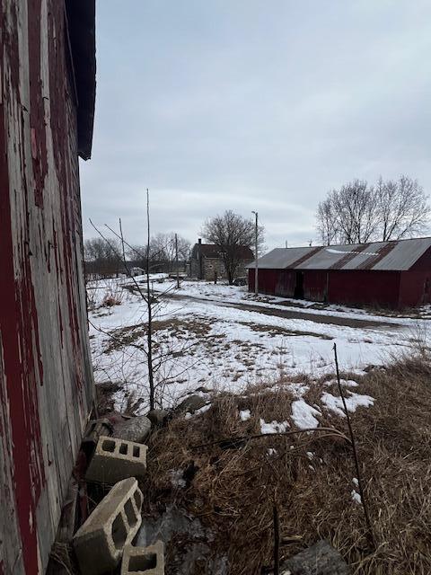 view of yard layered in snow