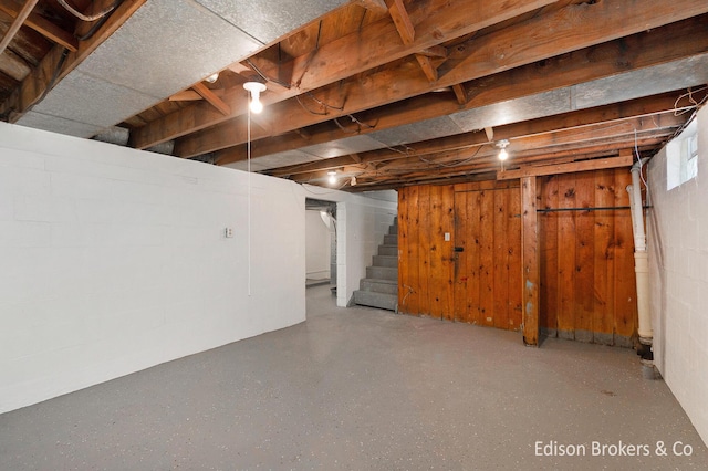 basement featuring stairway